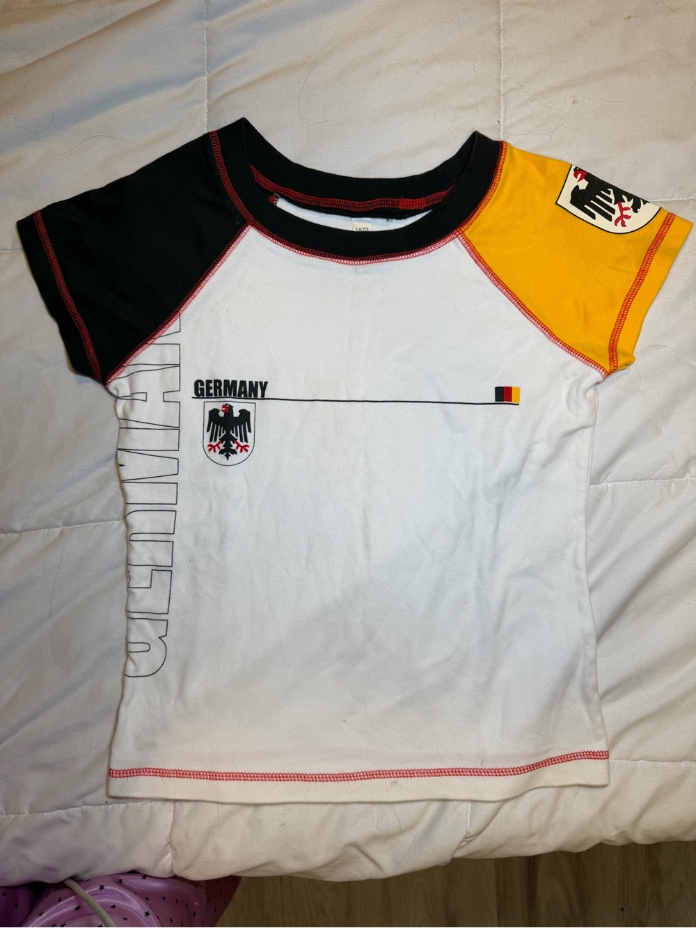 Le Tigre White Tee with Black & Yellow Raglan Sleeves and Germany Crest Patch